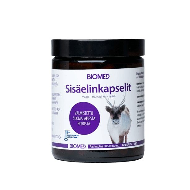 A brown plastic jar labeled Biomed Gift Set Reindeer by Biomed, with a reindeer photo, white and purple Finnish label, black lid—features Finnish reindeer organ capsules.