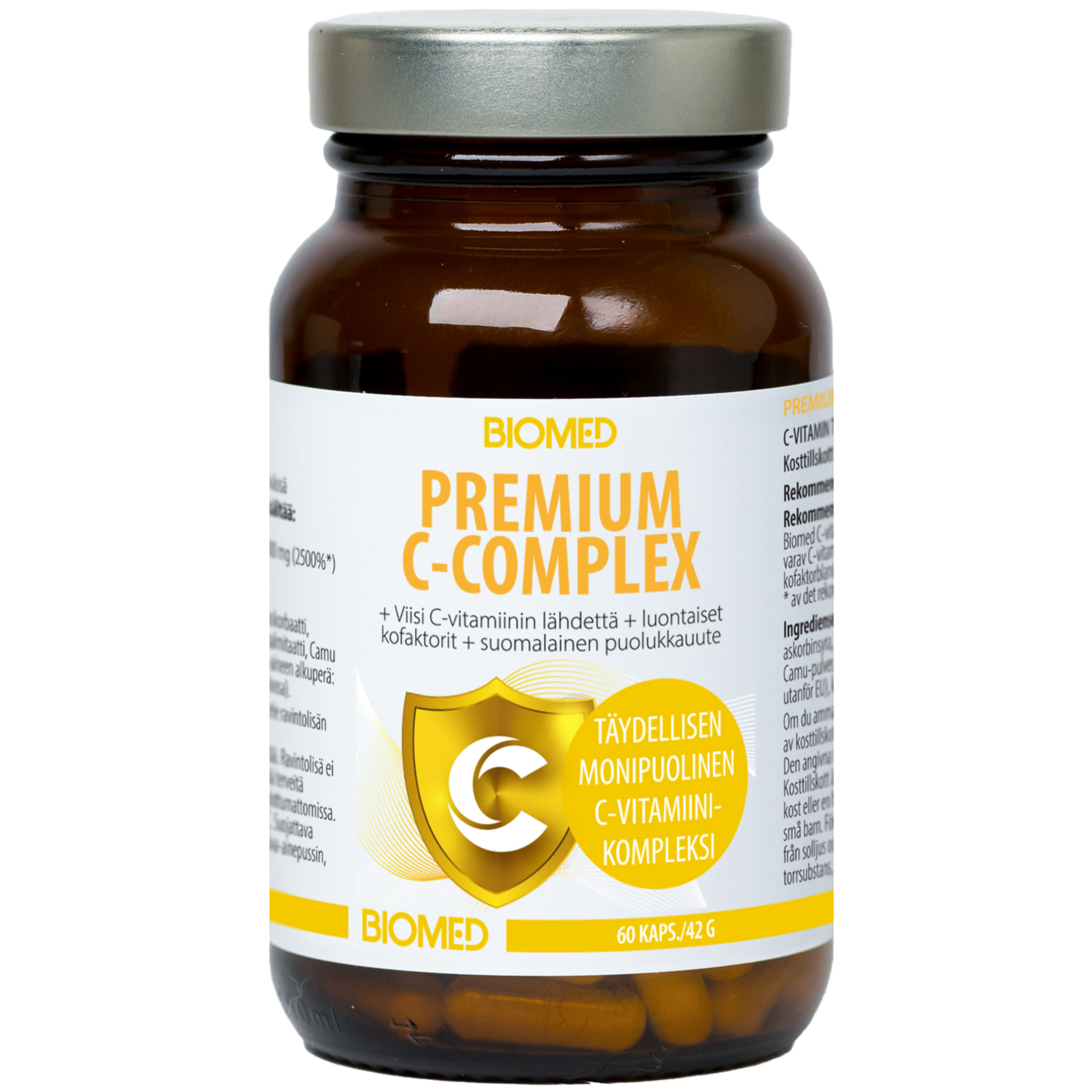 A brown glass bottle labeled Biomed Premium C-Complex by Biomed features a gray lid and a white-yellow Finnish/English label emphasizing immune support. Contains 60 Vitamin C complex capsules with Finnish lingonberry extract.
