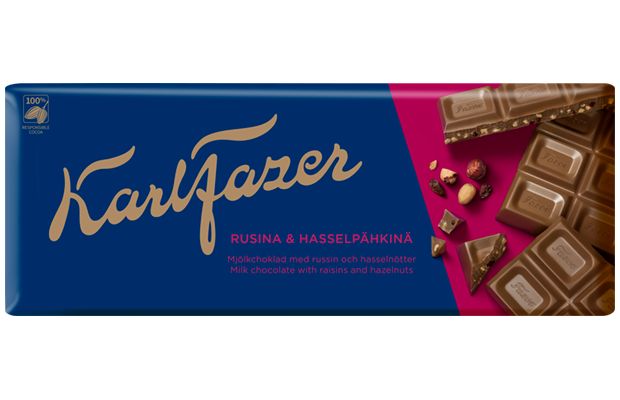A Fazer Milk Chocolate Raisin & Hazelnuts bar by Fazer comes in blue packaging, with the label in English and Finnish describing this classic Finnish chocolate filled with raisins and hazelnuts.