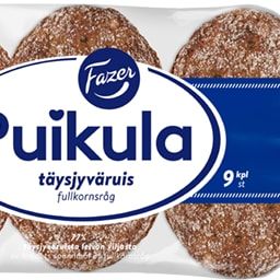 A package of Fazer Puikula Wholegrain Rye bread by Fazer shows nine round slices through clear packaging, with a blue and white Finnish-labeled tag and a pink heart accent.