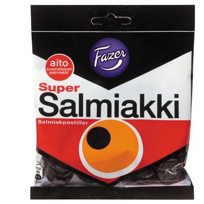 A bag of Fazer Super Salmiak Salty Liquorice pastilles from Fazer, with striking black, white, and red packaging—ideal for any Finnish candy lover.