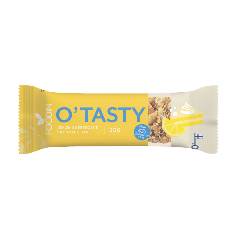A yellow and white Foodin O’Tasty Oat Bar Lemon Cheesecake wrapper displays oat clusters, a lemon slice, and cheesecake cream swirl. The 25g gluten-free snack bar features bright lemon and cheesecake visuals.