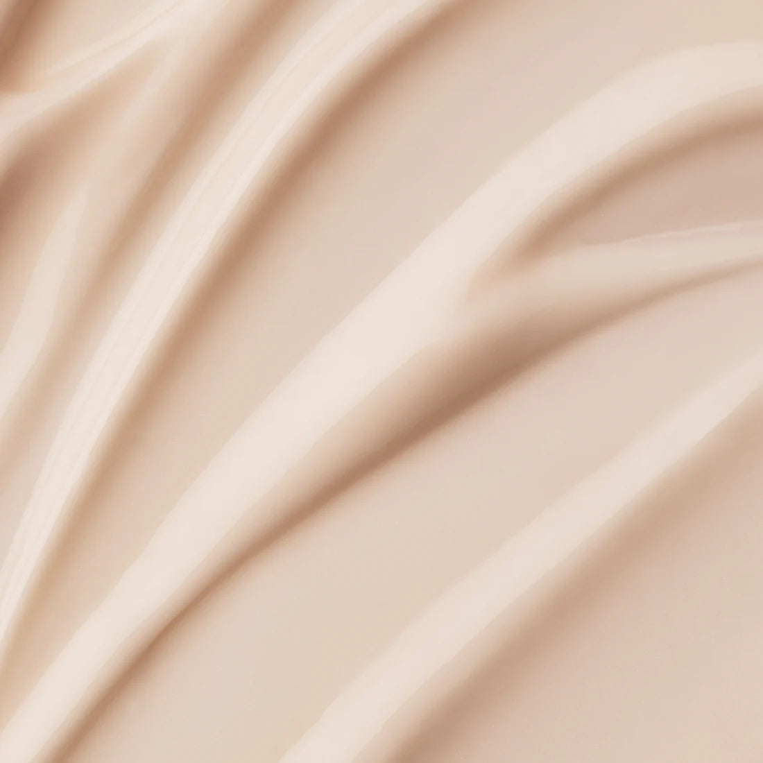 Close-up of smooth, cream-colored fabric with soft, flowing folds and gentle shadows, evoking the elegant, silky texture of Lumene Nordic-C Glow Moisturizer by Lumene.