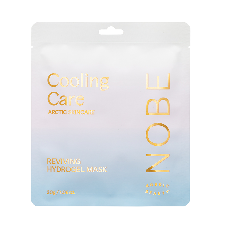 A square sachet of NOBE Nordic Beauty’s Cooling Care Reviving Hydrogel Mask features gold and blue text on a pastel white-to-pink-to-blue gradient. Size: 30g / 1.06 oz.