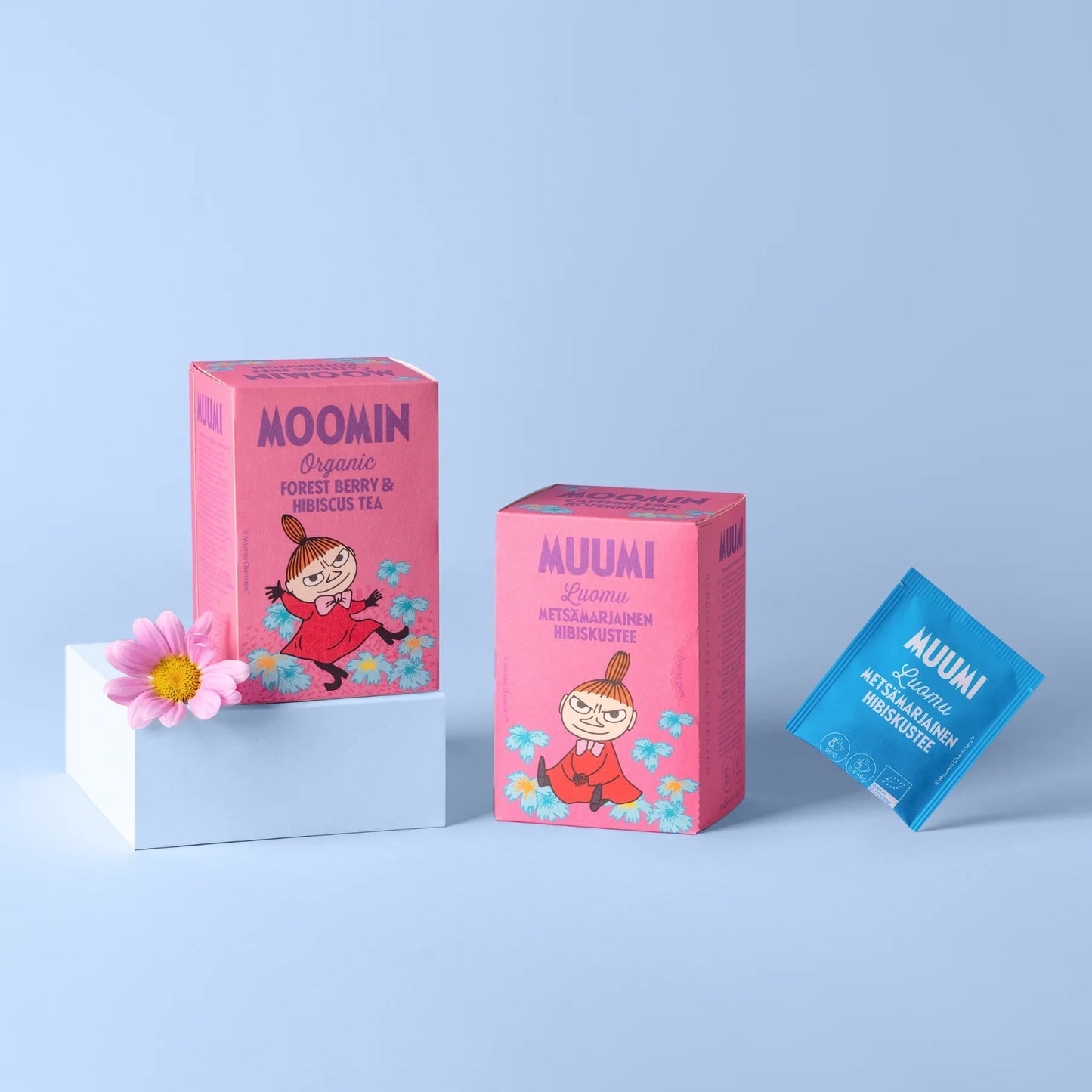 Moomin-themed tea packaging on a light blue background