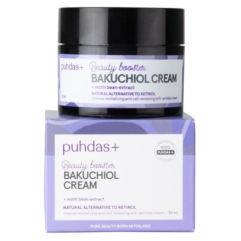 A jar of Puhdas+ Bakuchiol Beauty Booster Cream, a natural retinol alternative with moth bean extract, sits atop its matching purple box.