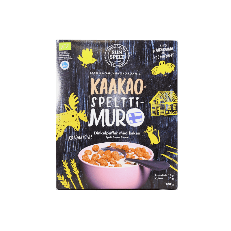 A box of SunSpelt Organic Spelt Cocoa Cereal, a chocolate-flavored spelt cereal, shows yellow moose, bear, cabin, and tree illustrations on a dark background with a cereal bowl and spoon in front.