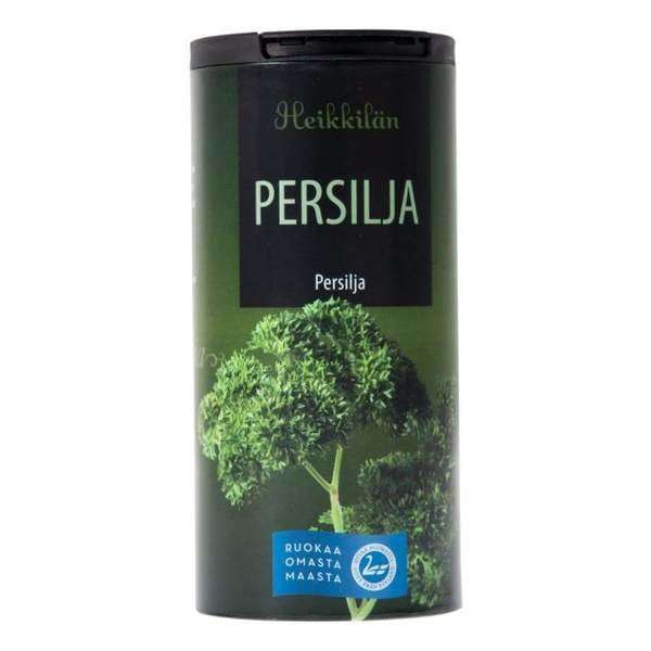 Heikkilä's Parsley comes in a cylindrical container with a dark green label, Finnish text, and an image of curly dried parsley. This salt-free Heikkilä's product is ideal for seasoning your favorite dishes.
