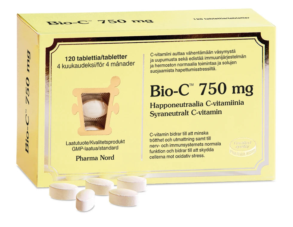 Eine gelbe Schachtel mit Pharma Nord Bio-C Vitamin 750 mg, mit einem Fenster, das die Tabletten zeigt, und einigen weißen ovalen Tabletten davor. Auf der Schachtel steht Text in Finnisch und Schwedisch.