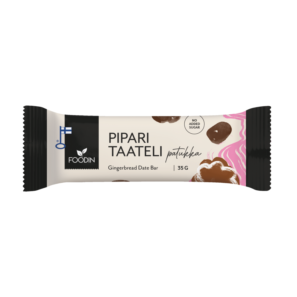 Ein Foodin Lebkuchen-Dattelriegel mit der Aufschrift "Pipari Taateli patukka" und "Ohne Zuckerzusatz" präsentiert Dattelstücke und ein rosafarbenes Wirbeldesign und wirbt für diesen veganen Snack als festlichen Genuss. Marke: Foodin.