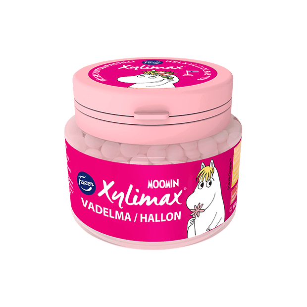 Eine rosafarbene Dose Fazer Xylimax Mumin-Himbeer-Pastillen, gelatinefrei und mit der Aufschrift Vadelma/Hallon versehen, zeigt Mumin-Charaktere - perfekt für Fans von Fazer und den geliebten Mumins.