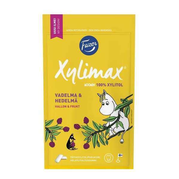 Fazer Xylimax Mumin Himbeer-Frucht-Kaugummi: Eine gelbe, finnische Packung mit einer weißen Moomin-Figur, Himbeerbildern und einem Text, der auf den Himbeer- und Fruchtgeschmack hinweist, mit 100% Xylitol. Ein leckerer Leckerbissen von Fazer.