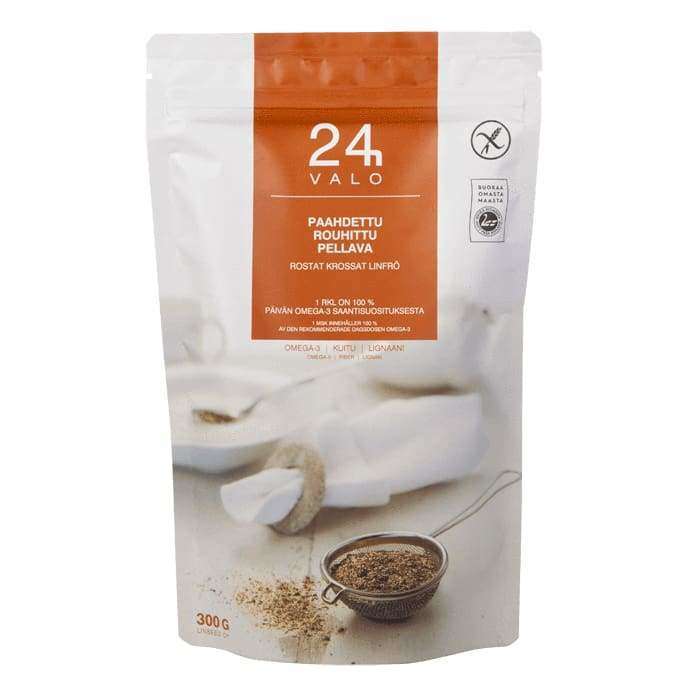 Una confezione richiudibile da 300 g di colore bianco e arancione con l'etichetta Valo24h Roasted Ground Flaxseed (semi di lino tostati e macinati) riporta l'immagine di semi di lino ricchi di omega-3, un cucchiaio e un colino, la certificazione e le icone nutrizionali. Marca: Valo24h.