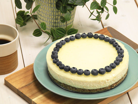 Ketogenic lemon cheesecake with brries on a plate