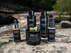 Taiga Cosmetics product line on a sunny rock