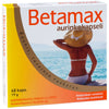 A box of Hankintatukku Betamax suntan supplement capsules, featuring a woman in a white bikini and sun hat by the blue sea. The package has orange and yellow accents and Finnish text.