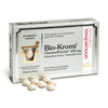 A box of Pharma Nord Bio-Chromium 100 mikrog is shown with seven round beige tablets in front. This chromium yeast supplement aids blood sugar control. The 60-tablet box displays text in Finnish.