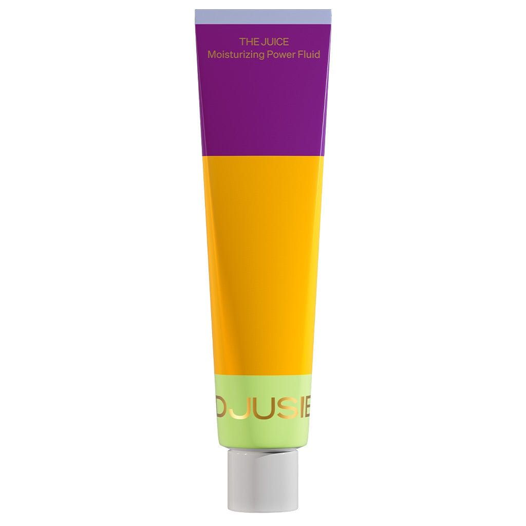 A tube from the Djusie Dream Team Box by Djusie stands upright on a white background, featuring a purple, yellow, and light green design with a white cap.