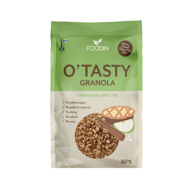 A 350g pack of Foodin O`Tasty Granola Cinnamon Apple Pie, made with gluten-free Finnish oats. The green and beige bag features no added sugar plus granola, cinnamon stick, apple slice, and pie illustrations.