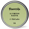 A round metal tin with a light green lid labeled "Frantsila 11 Herb Salve 19g" contains Frantsila's effective herbal salve for natural skin healing.