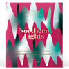 A square package of Northern Lights craft chocolate by Coodio, featuring a bold abstract design with wavy magenta, teal, and white shapes and gold text.