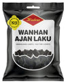 A black bag of Halva Old Time Licorice features images of licorice pieces, a yellow 1931 badge, and multilingual text, showcasing this traditional Halva brand treat.