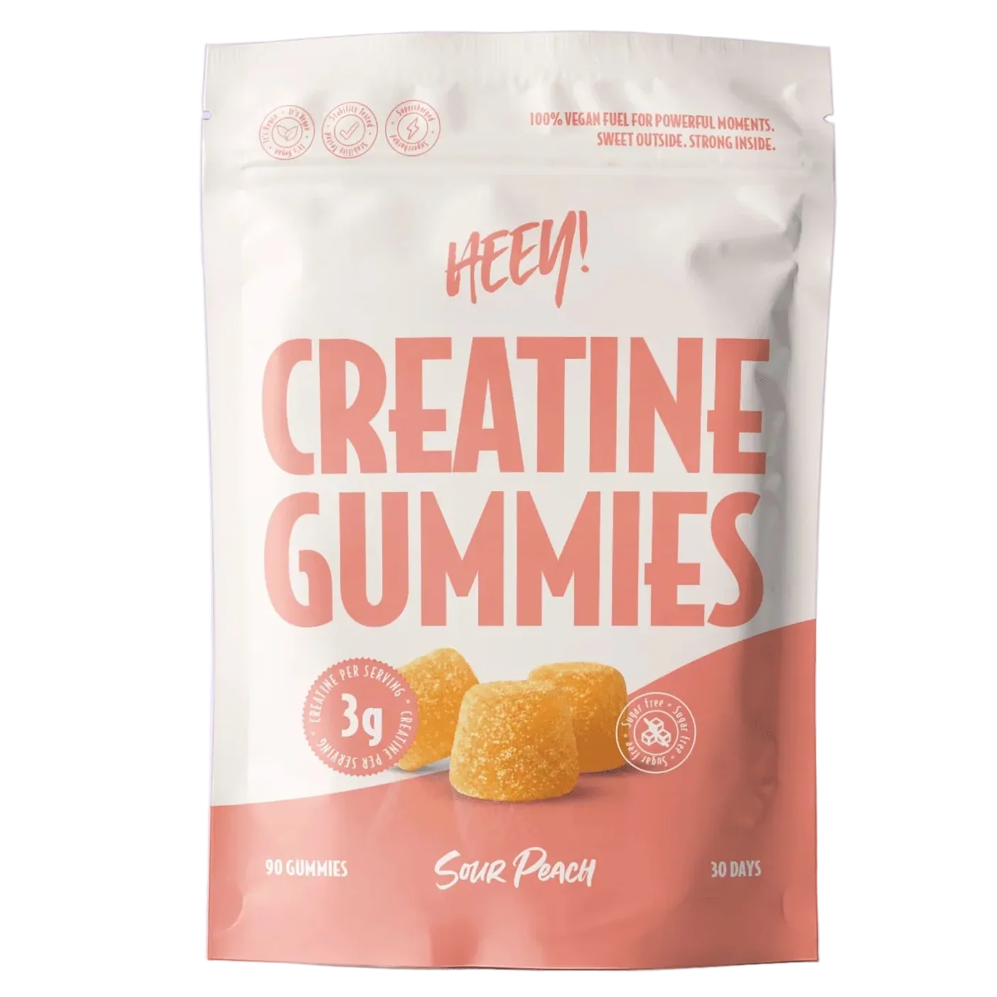 A stand-up pouch of Heey! Creatine Gummies in Sour Peach flavor, featuring a white and peach design with illustrations of three peach-colored gummies.