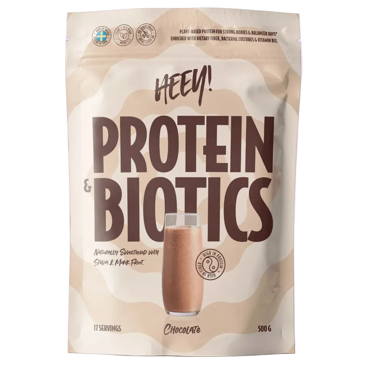 A 500g stand-up pouch of Heey! Protein & Biotics Chocolate flavor protein powder. The packaging features a beige and light brown abstract wavy pattern, bold dark brown text, and an illustration of a glass of chocolate protein shake.