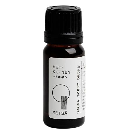 A small dark glass bottle with a black cap and white label reading "Hetkinen Sauna Scent Forest" features minimalist black line art and text in English and Japanese, making it perfect for an aromatic sauna experience. Brand: Hetkinen.