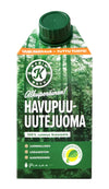 A 6-pack of Kari's Pine Extract Drink in green and white cartons with Finnish text, forest imagery, and green caps, promoting a natural, additive-free beverage rich in antioxidants.