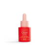 A red and pink dropper bottle from the Luonkos Glow & Shine Skincare Set stands upright on a white background—a radiant Finnish natural cosmetic for your daily routine.