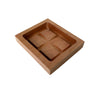 The Metsä/Skogen Soap Dish by Metsä/Skogen is a handcrafted wooden square tray with raised edges and a cross-shaped divider creating four sections. It is shown against a white background.
