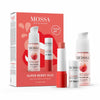 Mossa Berry Kiss Gift Set features an overnight peeling serum and a hydrating lip balm, both in white and pink packaging, displayed in front of a box decorated with strawberry and raspberry illustrations.