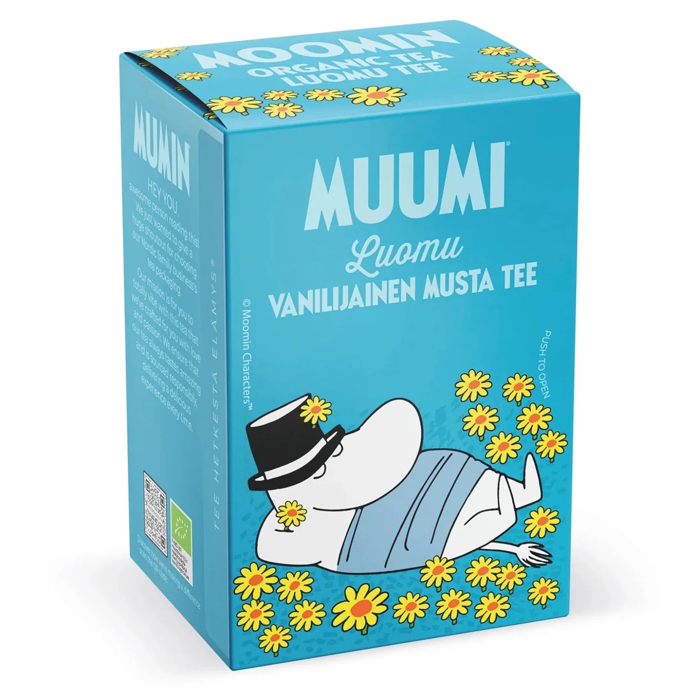 A blue box of Moomin tea featuring the Moomin character lying among yellow flowers, with the text 'MUUMI Luumu VANILJAINEN MUSTA TEE' on the front.