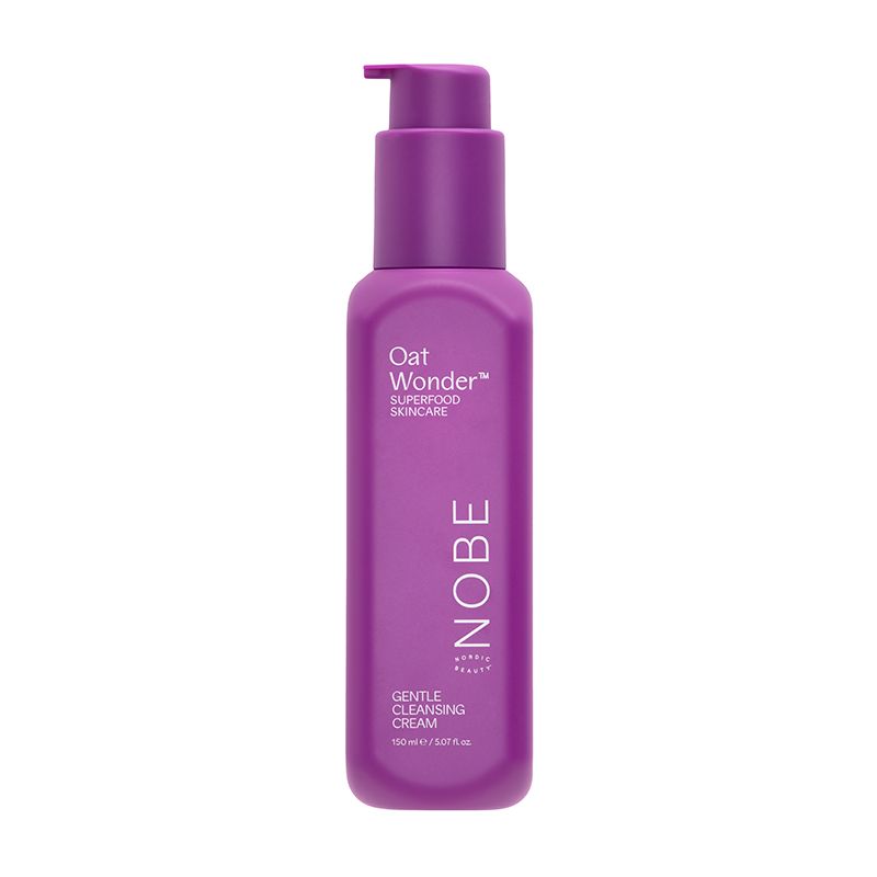 A 150 ml purple bottle of NOBE Oat Wonder® Gentle Cleansing Cream by NOBE Nordic Beauty with Fazer Oat Oil, a pump dispenser, and "Superfood Skincare" on the label.
