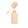 A beige dropper bottle labeled NOBE Oat Wonder® Nourishing Face Oil from NOBE Nordic Beauty, with the cap off and yellow oil visible in the dropper.