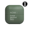 A green 100ml container of NOBE Nordic Forest Bath Skincare Rituals by NOBE Nordic Beauty with minimalist white text. Vegan formula contains forest microbiome extract, featuring the European Natural Beauty Awards Excellence logo top right.