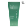 A green tube of NOBE Nordic Forest Bath Skincare Rituals by NOBE Nordic Beauty, 50ml, with forest microbiome extract and white text plus a RECONNECTING WITH NATURE logo—ideal for any Nordic Skincare Gift Set.