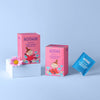 Moomin-themed tea packaging on a light blue background