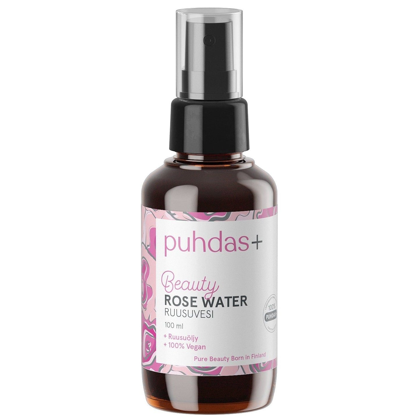 A 500 ml amber glass spray bottle of Puhdas+ Beauty Rose Water with a black pump and a white label featuring pink floral accents, set against a plain white background.