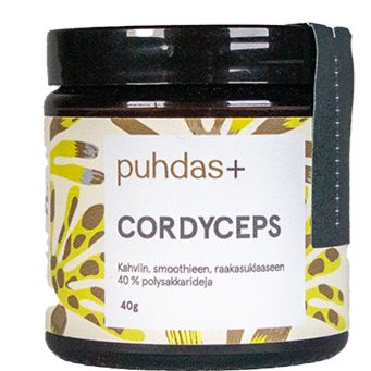 A jar of Puhdas+ Cordyceps supplement, featuring a black lid and base, a white label with brown and yellow patterns, and a black hanging tag on a white background.