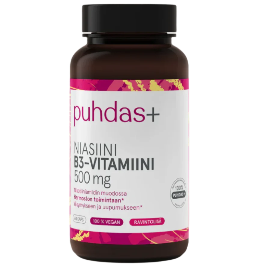 A bottle of Puhdas+ Niasiini B3-Vitamiini 500 mg dietary supplement. The product is in a dark brown bottle with a black cap and a white label featuring pink and yellow accents.