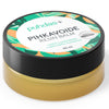 A 50 ml jar of puhdas+ Pihkavoide Resin Balm, featuring a black lid with a colorful tropical leaf pattern and a white label, containing a golden yellow balm.