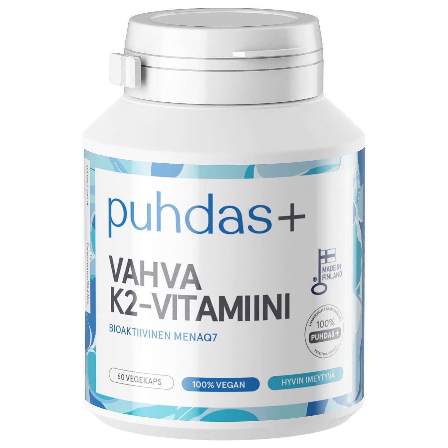 A white Puhdas+ Vitamin K2 100 mikrog bottle with blue accents shows “100% vegan,” “60 vegetarian capsules,” and “Made in Finland” in two languages, highlighting vitamin K2 (MenaQ7 menaquinone) for bone support.