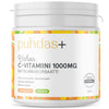 A white container of Puhdas+ Vitamin C Powder 1000 mg features colorful orange slice graphics, a green vegan label, and Finnish text on the front with dosage, ingredients, and product details. Brand: Puhdas+.