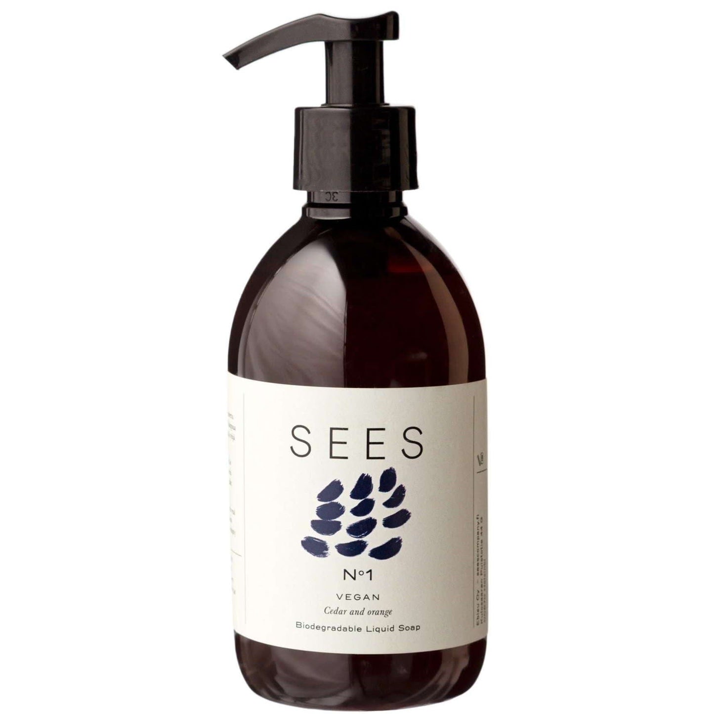 A pump bottle of SEES Company Hand Wash No. 1 Cedar & Orange with a white label, black text, and minimalist leaf design. The vegan liquid soap offers a natural cedar and orange scent for a refreshing handwashing experience.
