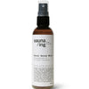 The sauna/ing Sauna Serum Mist by sauna/ing is a brown and white hydrating face spray with a black pump and clear cap, designed for post-sauna skincare.