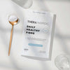 Thera Nordic Daily Healthy Fibre package with a spoonful of powder and glasses on a light background