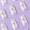 Several white bottles labeled THERA Nordic Optimized Enzymes are arranged diagonally on a light purple background, emphasizing the brand’s digestive enzyme formula for bloating relief in a repeating pattern.