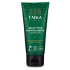 A green tube of Taika Brightening Face Scrub for all skin types, with Finnish and English text, eco-certification logos, and a black cap—moisturizing exfoliation leaves skin smooth and radiant.